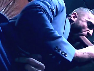 Classy hunk sucks a gloryhole cock before being hammered